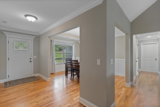7083 Blue Springs Rd SE, Cleveland, TN 37311 - foyer entrance featuring light wood-type flooring and ornamental molding