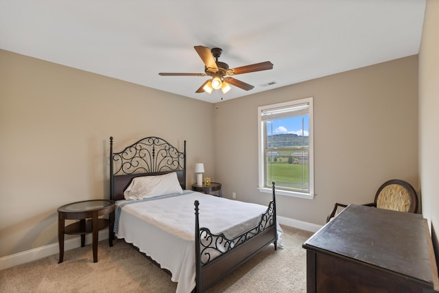 7083 Blue Springs Rd SE, Cleveland, TN 37311 - bedroom with light carpet and ceiling fan