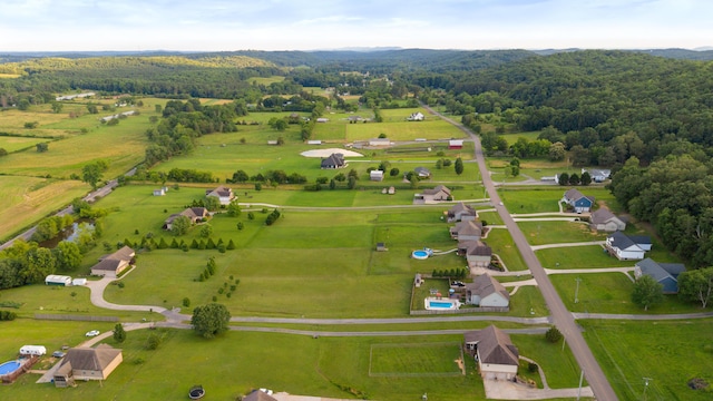 7083 Blue Springs Rd SE, Cleveland, TN 37311 - view of rural area featuring a heavily wooded area