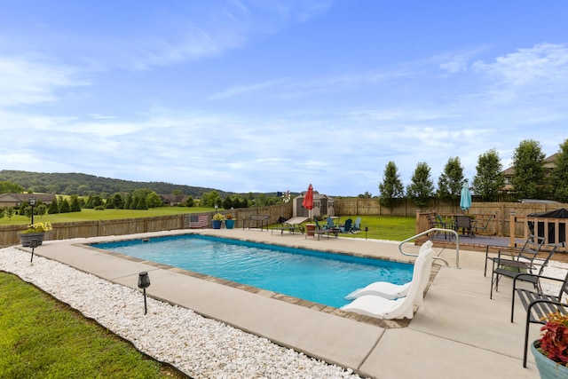 7083 Blue Springs Rd SE, Cleveland, TN 37311 - view of swimming pool featuring a water slide, a fenced backyard, and a patio