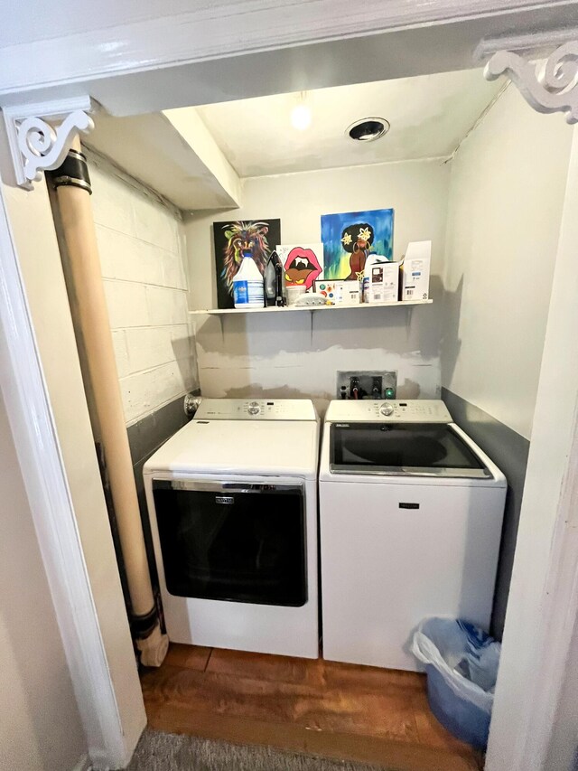 laundry room featuring laundry area and washer and clothes dryer