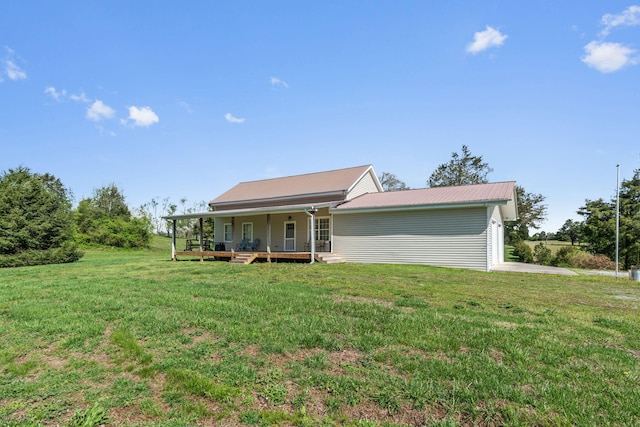 view of front of house with a front lawn and covered porch