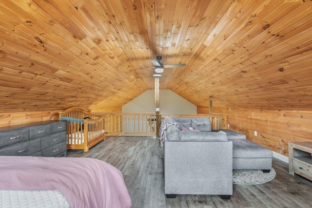 unfurnished bedroom featuring wood ceiling, wooden walls, wood-type flooring, and lofted ceiling