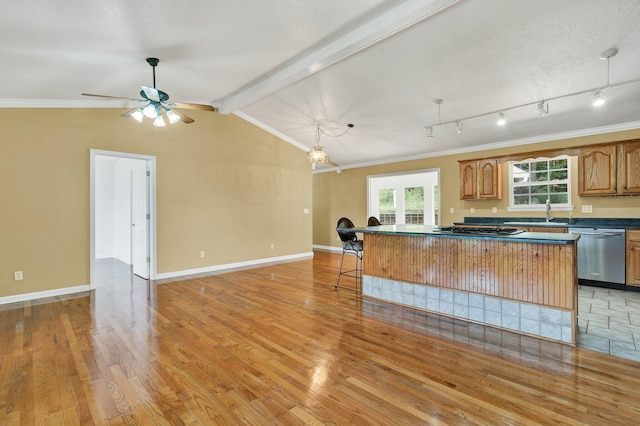 1454 Benjamin Cir NW, Cleveland, TN 37312 - kitchen with dishwasher, dark countertops, gas stovetop, light wood finished floors, and a ceiling fan