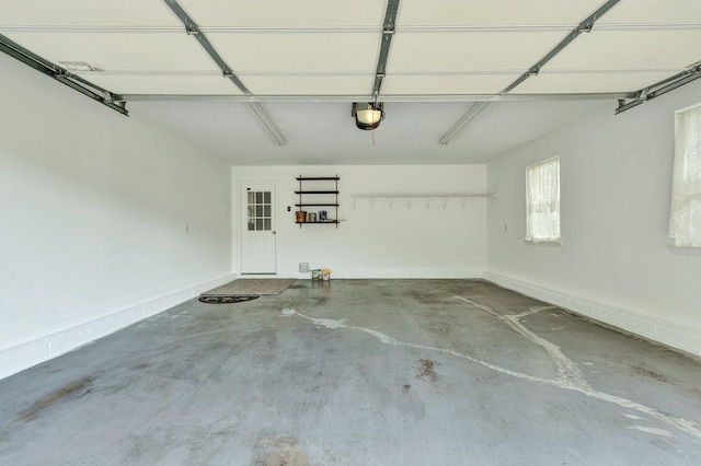 1454 Benjamin Cir NW, Cleveland, TN 37312 - garage featuring a garage door opener and baseboards