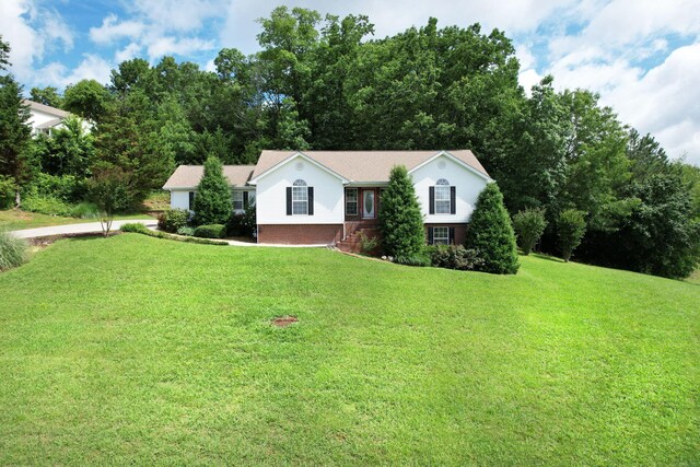 1454 Benjamin Cir NW, Cleveland, TN 37312 - single story home featuring a front lawn and brick siding