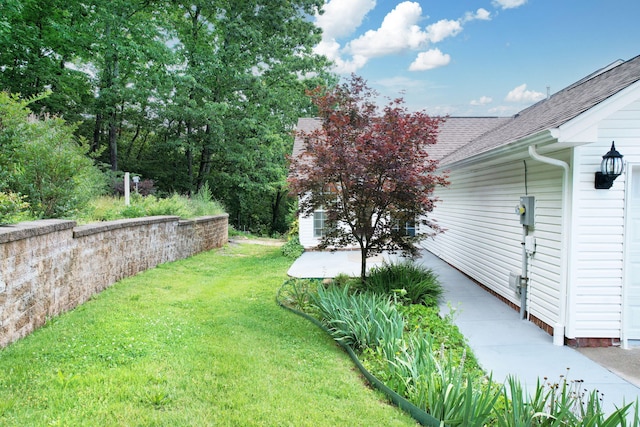 1454 Benjamin Cir NW, Cleveland, TN 37312 - view of green lawn featuring a patio area