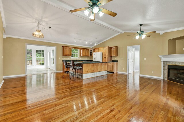 1454 Benjamin Cir NW, Cleveland, TN 37312 - living room with ceiling fan, light wood-style floors, crown molding, and baseboards