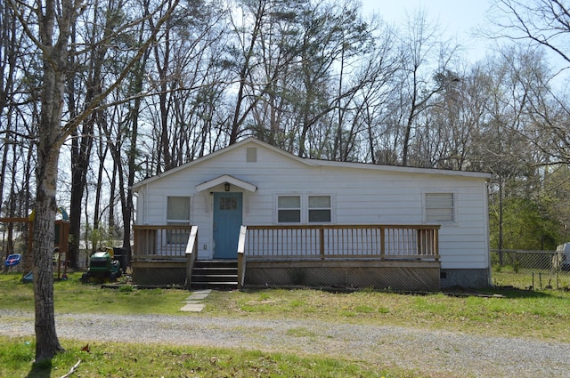 183 Bettis Ave SW, Cleveland, TN 37311 - manufactured / mobile home with fence, a wooden deck, and crawl space