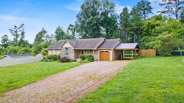 7510 Hewitt Ln, Chattanooga, TN 37421 - ranch-style home with driveway, an attached garage, stone siding, and view of wooded area