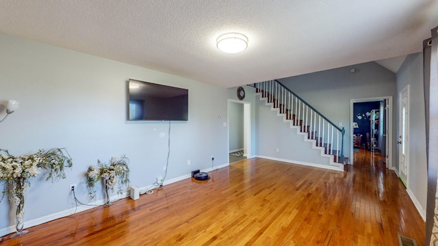 LOT1 Cabrera Dr SE, Cleveland, TN 37323 - unfurnished living room featuring stairs, light wood-type flooring, and a textured ceiling