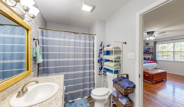 LOT1 Cabrera Dr SE, Cleveland, TN 37323 - ensuite bathroom with wood finished floors, vanity, a textured ceiling, and a ceiling fan