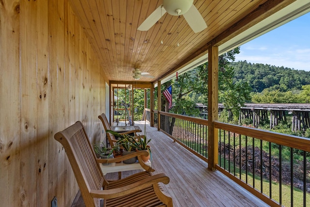 101 Riverview Ln, Reliance, TN 37369 - wooden terrace with a ceiling fan and a wooded view