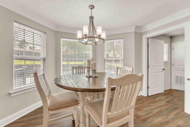 1732 Brookwood Dr NE, Cleveland, TN 37323 - dining area featuring a chandelier, wood finished floors, baseboards, and ornamental molding
