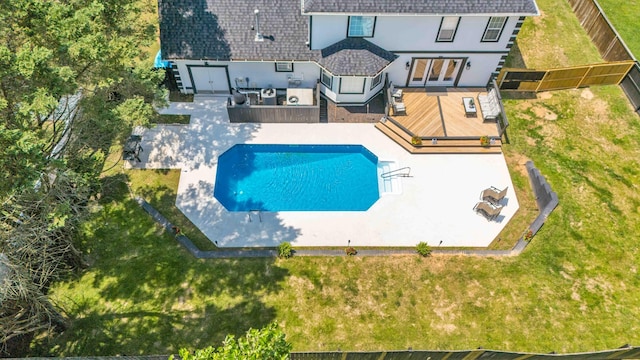 1732 Brookwood Dr NE, Cleveland, TN 37323 - outdoor pool featuring a fenced backyard, a deck, a patio, and a lawn