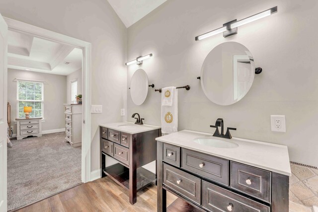 1732 Brookwood Dr NE, Cleveland, TN 37323 - full bath with a sink, two vanities, a tray ceiling, and wood finished floors