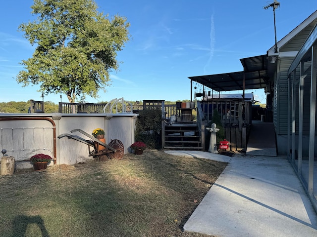 view of yard with a deck