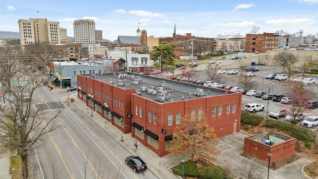 birds eye view of property featuring a view of city