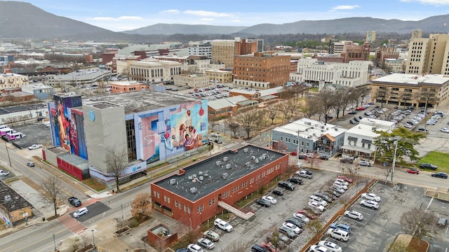 bird's eye view with a view of city and a mountain view