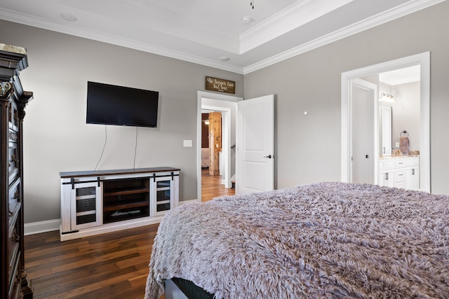 bedroom featuring ensuite bathroom, dark wood-type flooring, and ornamental molding