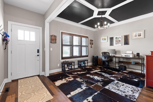 foyer entrance featuring a notable chandelier, crown molding, and dark wood-type flooring