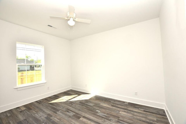 1903 Sharp St, Chattanooga, TN 37404 - empty room featuring dark wood finished floors, baseboards, and a ceiling fan