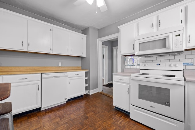 kitchen with dark parquet floors, backsplash, white cabinets, ceiling fan, and white appliances