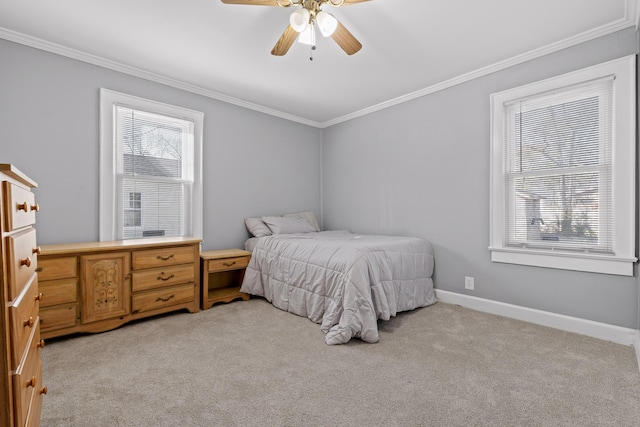 bedroom featuring light carpet, crown molding, multiple windows, and ceiling fan