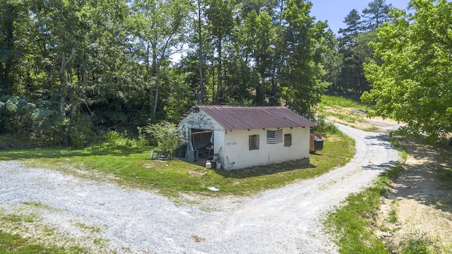 7209 Anthem Trl, Birchwood, TN 37308 - view of outdoor structure with a wooded view