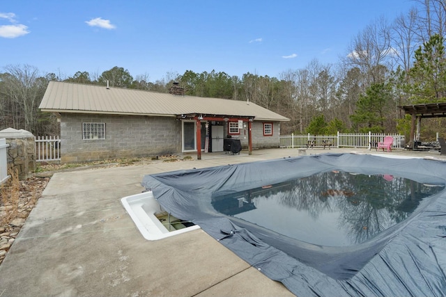 view of pool featuring a patio