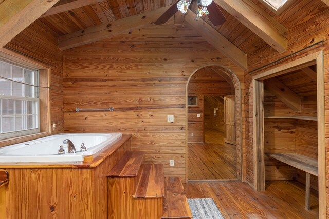 bathroom with wood walls, ceiling fan, wood-type flooring, and wooden ceiling