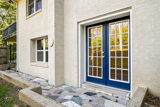 entrance to property featuring french doors