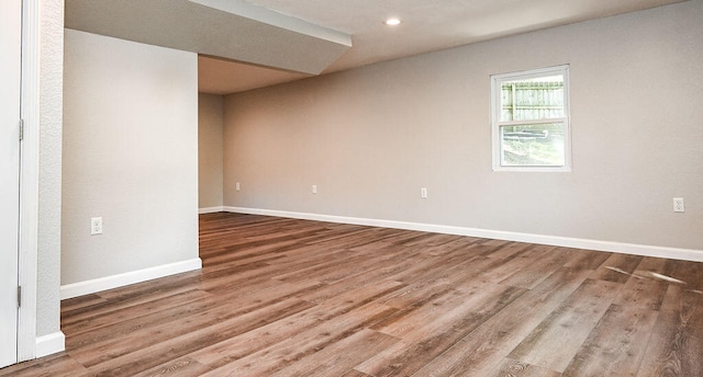 spare room featuring hardwood / wood-style floors