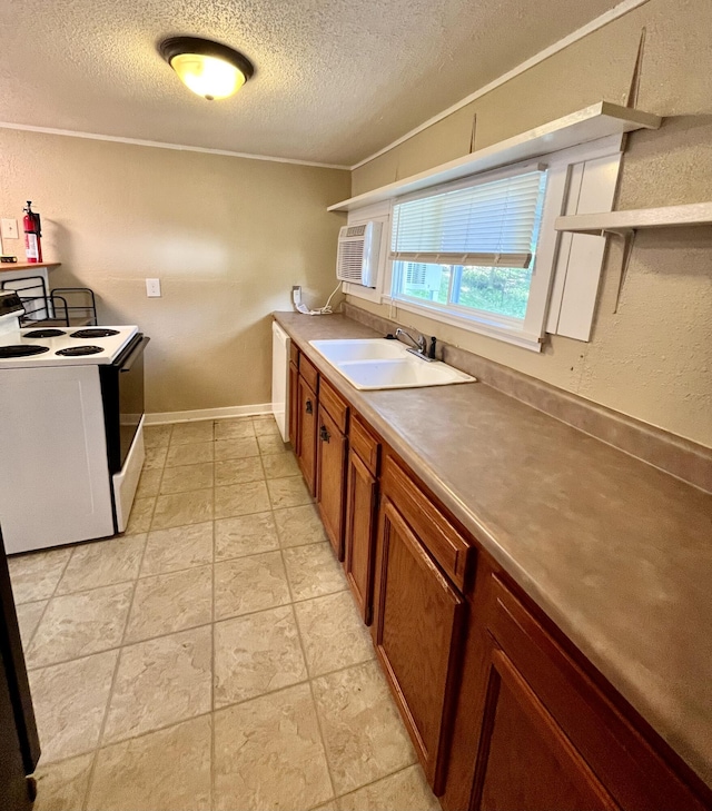 201 S Facy St, Rockwood, TN 37854 - kitchen with range with electric stovetop, a sink, a textured ceiling, brown cabinetry, and baseboards