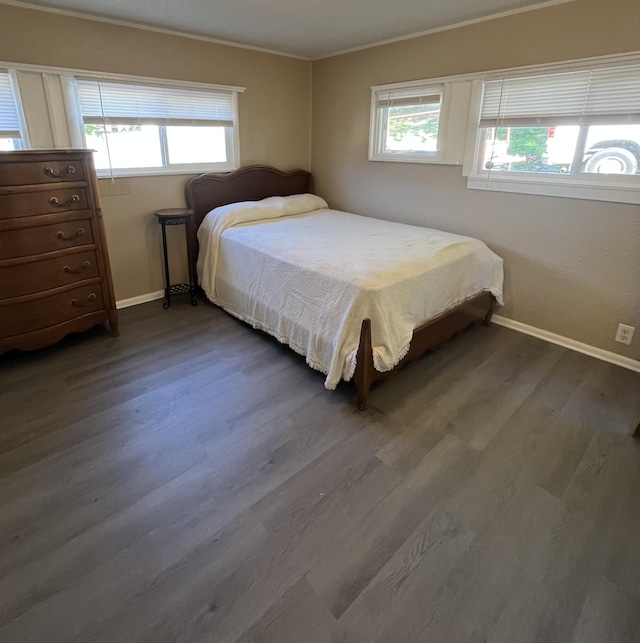 201 S Facy St, Rockwood, TN 37854 - bedroom with multiple windows, dark wood-style flooring, baseboards, and crown molding