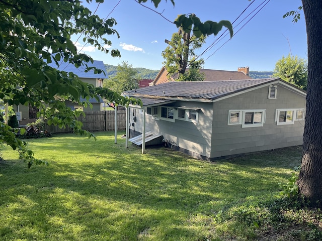 201 S Facy St, Rockwood, TN 37854 - rear view of property with metal roof