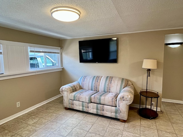 201 S Facy St, Rockwood, TN 37854 - living area featuring a textured ceiling and baseboards