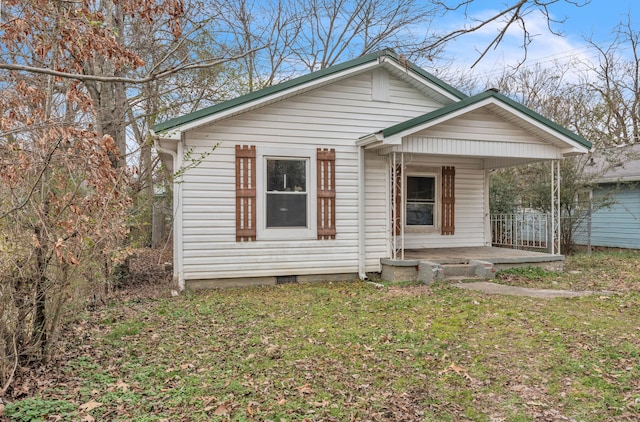 bungalow-style home featuring a front yard and a porch