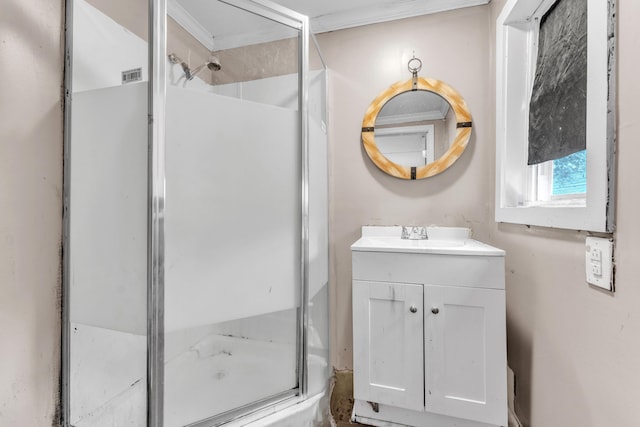 bathroom with walk in shower and vanity