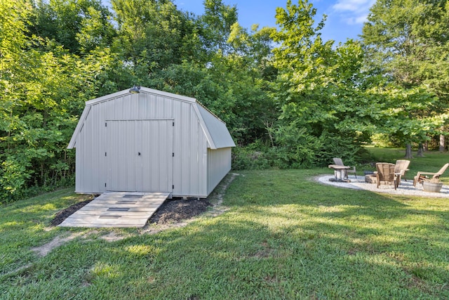 view of shed with a fire pit