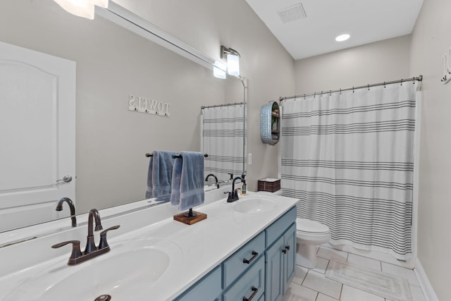 full bath with toilet, a sink, visible vents, and tile patterned floors