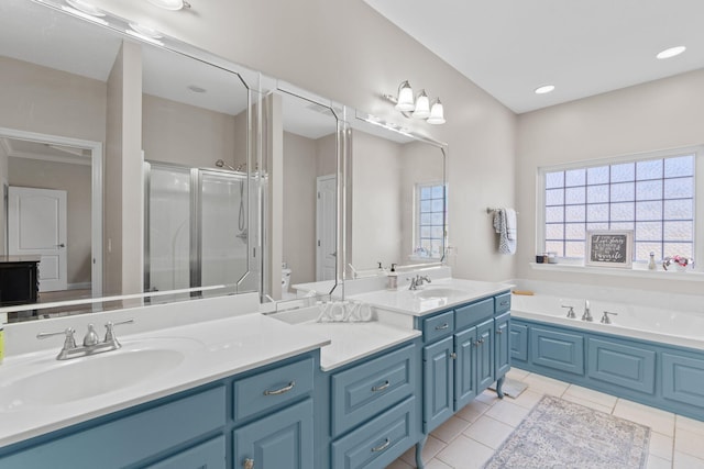 bathroom with toilet, tile patterned floors, a garden tub, vanity, and a shower stall