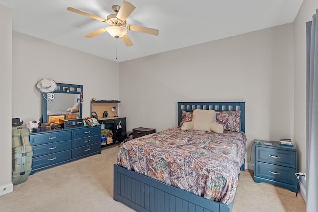 carpeted bedroom featuring a ceiling fan