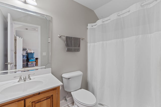 full bathroom with vanity and toilet
