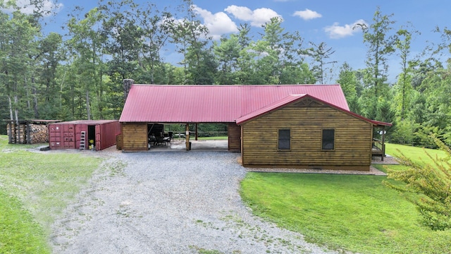 view of front of home with an outdoor structure