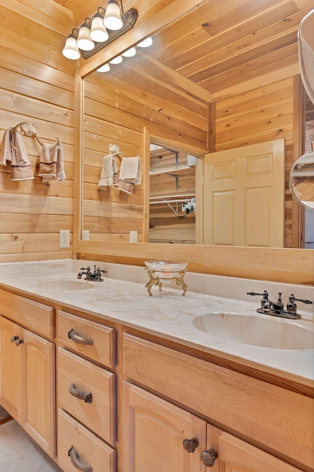 bathroom with vanity, wooden ceiling, and wood walls