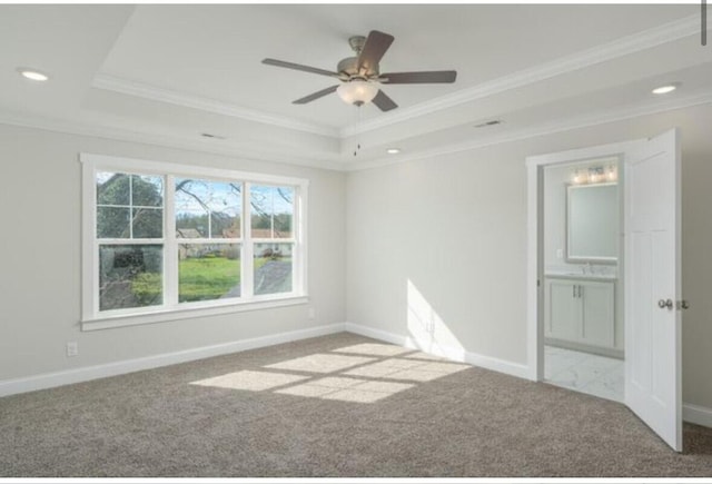 5013 Solar Ln NW, Cleveland, TN 37312 - spare room featuring crown molding, a raised ceiling, carpet flooring, recessed lighting, and baseboards
