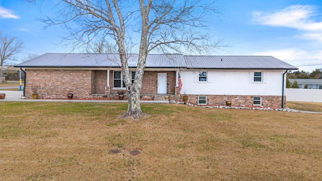 view of front facade with a front lawn