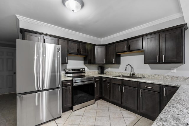 kitchen with appliances with stainless steel finishes, ornamental molding, and sink