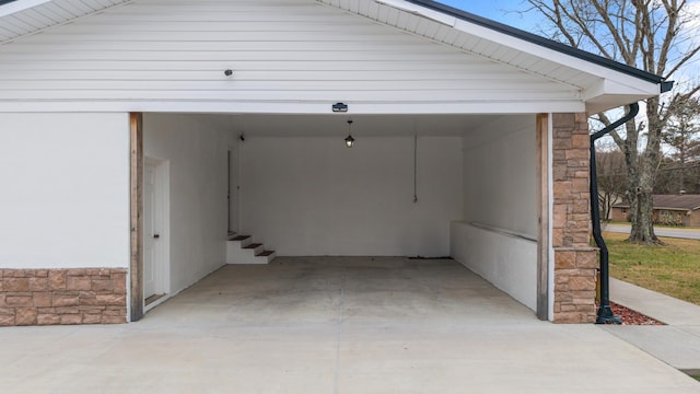 garage featuring a carport